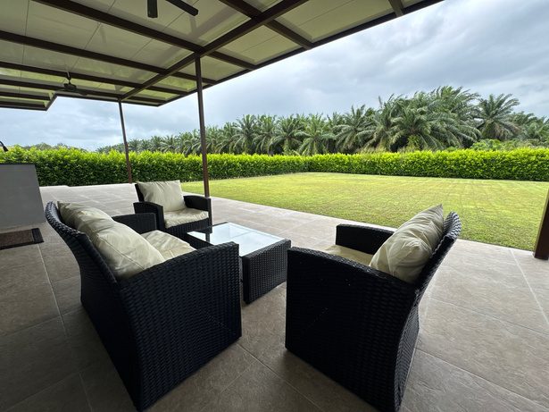 Outdoor seating on the 77.5 m² covered terrace of CBV10