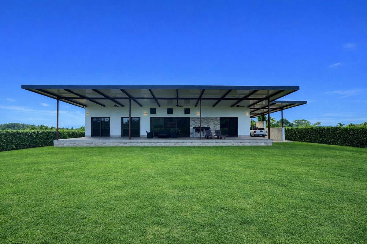 CBV10 beach villa and its levelled lawn at Coco Beach Community