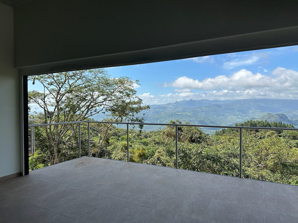 Covered roof terrace looking out over the Campana forest and mountains