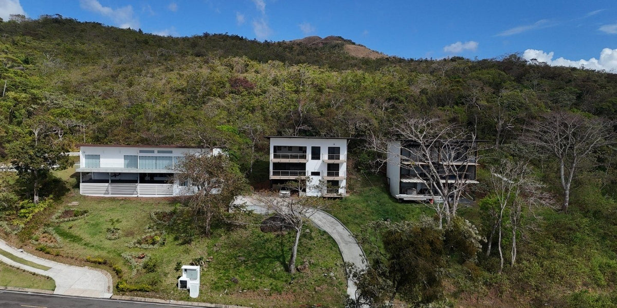 ChiQ residences on the forested hillside of Yuma Mountain Community